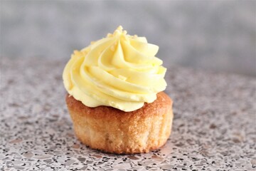 Closeup cupcake with lemon cream dessert sugar yummy pastry baked cooking cupcakes