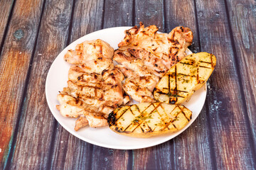 Charcoal Grilled Boneless Chicken with Halved Skin-Roasted Potatoes