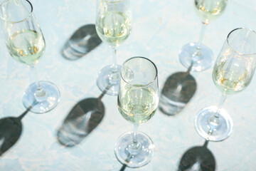 Glasses of champagne on grunge background
