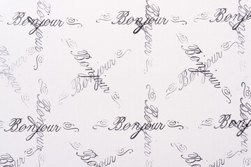 rubber stamp background with the french word bonjour © eugen