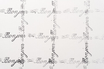 rubber stamp background with the french word bonjour © eugen