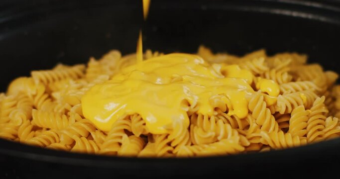 Closeup of homemade mac and cheese being prepared.