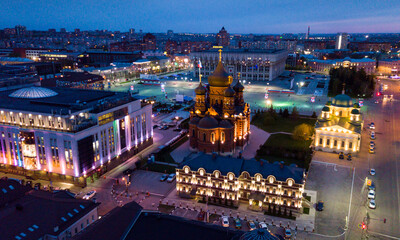 Night cityscape of Russian city Tula with Orthodox Cathedral, Regional administration and Transfiguration Church
