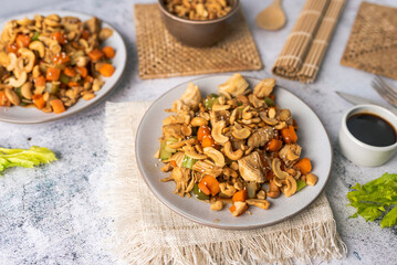 Obraz na płótnie Canvas Cashew chicken, home made Chinese food with limited ingredients, healthy alternative to take out. 