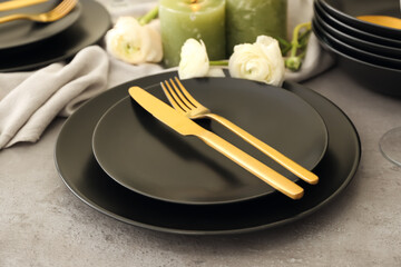 Stylish table setting on grey background