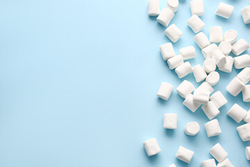 Tasty marshmallows on color background