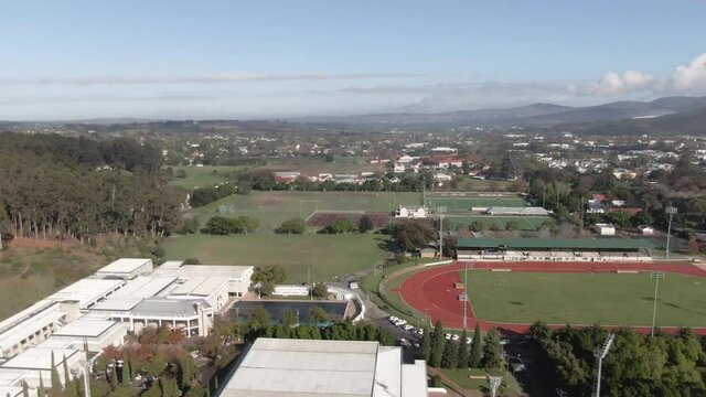 Aerial View Of A Football Pitch Surrounded By Oval Running Tracks For Athletics In South Africa.