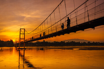 Suspension bridge in the beautiful twilight sunset
