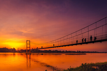 Suspension bridge in the beautiful twilight sunset