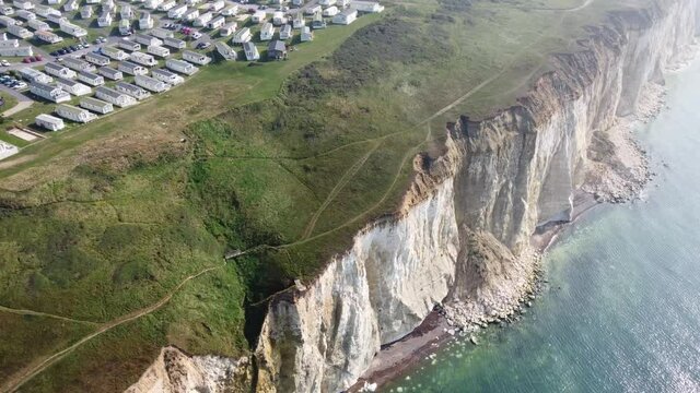 4K Aerial drone photography of coastal erosion around England's south coast. The beautiful white cliffs of Sussex are slowly being eroded where no coastal defences are in place.