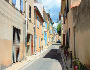 A beautiful view of the seaside town street buildings in Europe with its European architecture in La Ciotat, a city in French Riviera, the Mediterranean region of France and tropical destination.