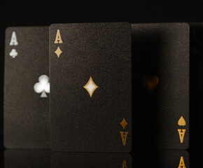 Black poker cards, three aces, a point. Casino, gambling house, poker club. Gambling, gambling business, risk, chance of winning, game strategy.