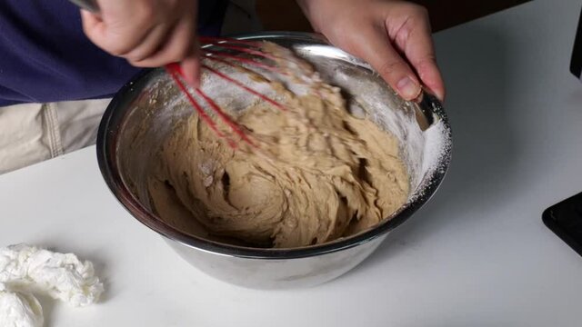Use a whisk to mix the dough to make slow motion cookies.