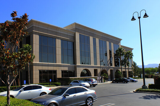 Front Of A Modern Office Building From Parking Lot