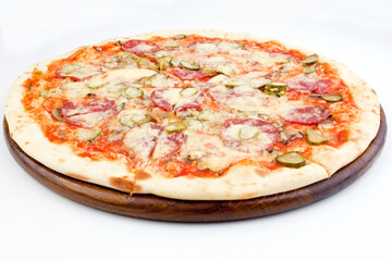 Italian pizza with melted mozzarella cheese, olives and tomato garnished  isolated on white background