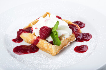 delicious sweet dessert on white plate with tea
