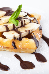 delicious sweet dessert on white plate with tea
