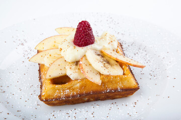 delicious sweet dessert on white plate with tea
