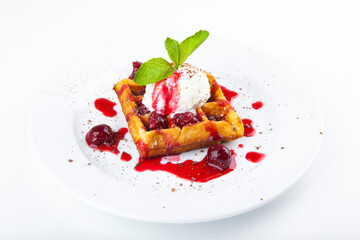 delicious sweet dessert on white plate with tea
