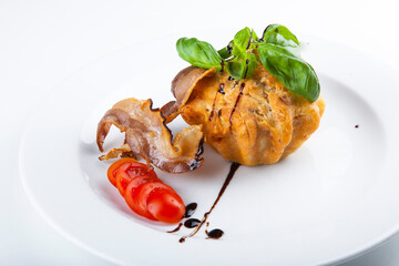 puff with bacon, meat and cheese filling with tomatoes

