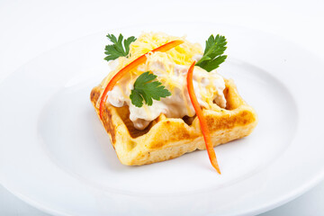 Belgian waffles with meat filling and mushroom sauce
