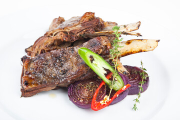 fried pork ribs with fried onions and salt