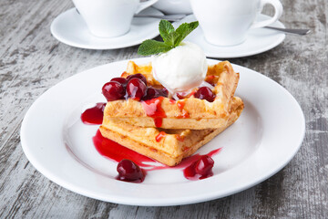 delicious sweet dessert on white plate with tea
