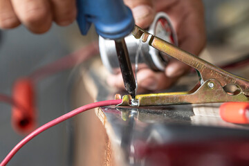 electrician working in a power supply