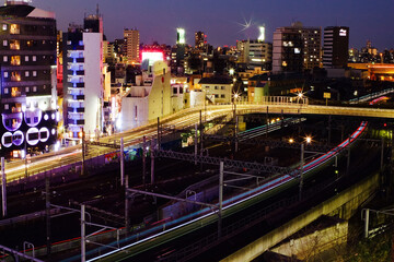 Fototapeta na wymiar Sunset and city buildings in Tokyo