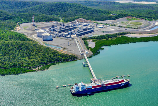 Aerial view of liquified natural gas plant and LNG ship on Curtis Island, Queensland