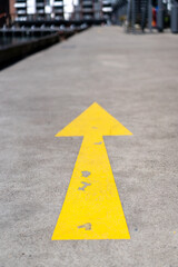 yellow arrow on the road