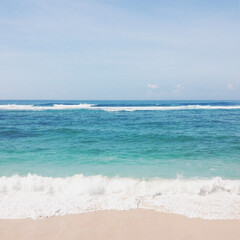 Fototapeta na wymiar White sand beach, crystal clear water on Gunung Payung Beach Bali Indonesia, in high resolution image