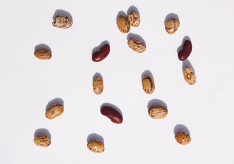 patterned kidney beans isolated white background. (Delicious mottled, raw common beans)