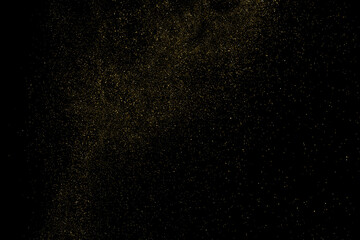 Fototapeta na wymiar Gold Glitter Texture Isolated on Black Background. Golden stardust. Amber Particles Color. Sparkles Rain. Vector Illustration, Eps 10.