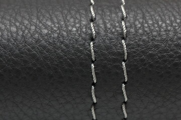 genuine leather texture with a decorative seam