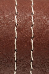 genuine leather texture with a decorative seam