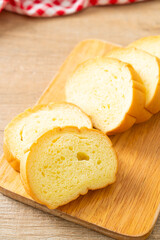 potatoes bread sliced on wood board
