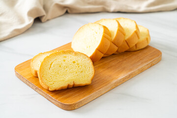 potatoes bread sliced on wood board