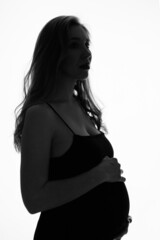 silhouette of Pregnant woman on a white background