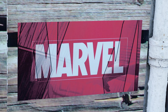 marvel comics shop logo brand and text sign front of boutique library books