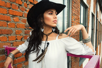 Beautiful smiling young south girl boho style clothing and jewelry