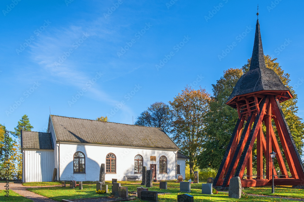 Poster Cemetery by a church and a bell tower