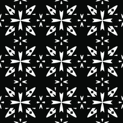 Flower geometric pattern. Seamless vector background. White and black ornament. Ornament for fabric, wallpaper, packaging. Decorative print