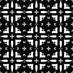 Flower geometric pattern. Seamless vector background. White and black ornament. Ornament for fabric, wallpaper, packaging. Decorative print