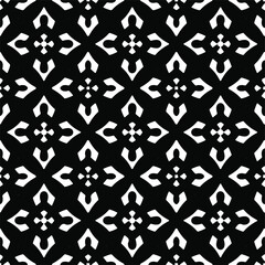 Flower geometric pattern. Seamless vector background. White and black ornament. Ornament for fabric, wallpaper, packaging. Decorative print