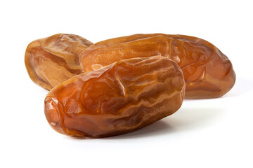 Three dried dates in close up on white background. Front view . Full depth of field. With clipping path