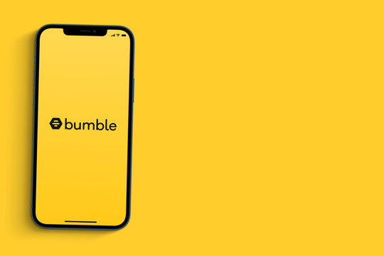 Bumble app on smartphone screen on yellow background. Rio de Janeiro, RJ, Brazil. September 2021.