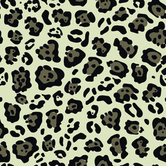 The jaguar is trendy. Seamless pattern with wild animal gray and black spots for modern fabrics, textiles, throw pillows, bedding. Gray background. Vector.