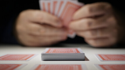 Gambling, Betting, and Winning. Playing Cards Games. One Person Playing Cards and Having Fun. Gamble Competition Gaming Cards.