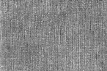 The texture of coarse gray linen fabric. Burlap, rags, coarse natural fabric.